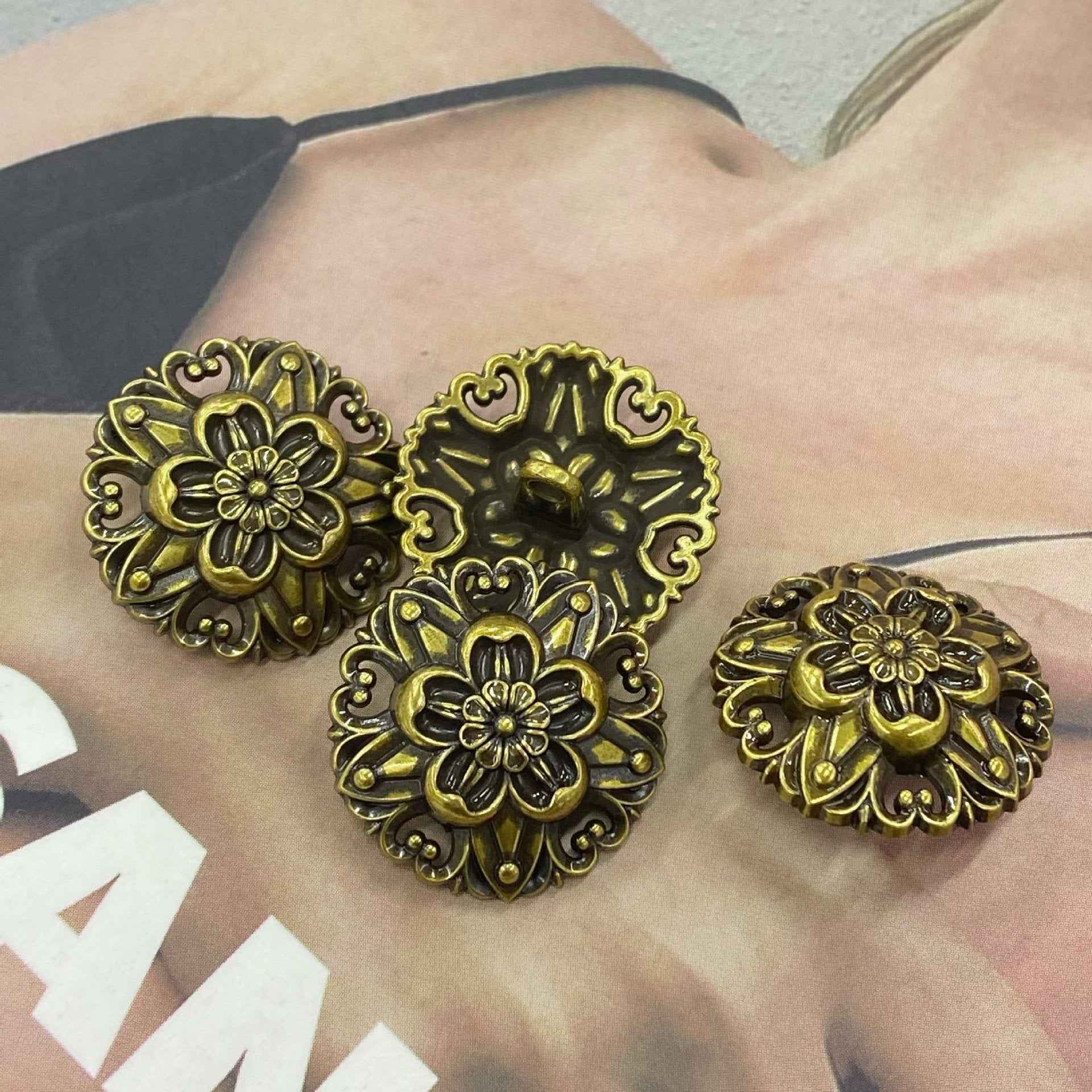 Five-petal flower metal shank buttons, bronze tone, 4 shown