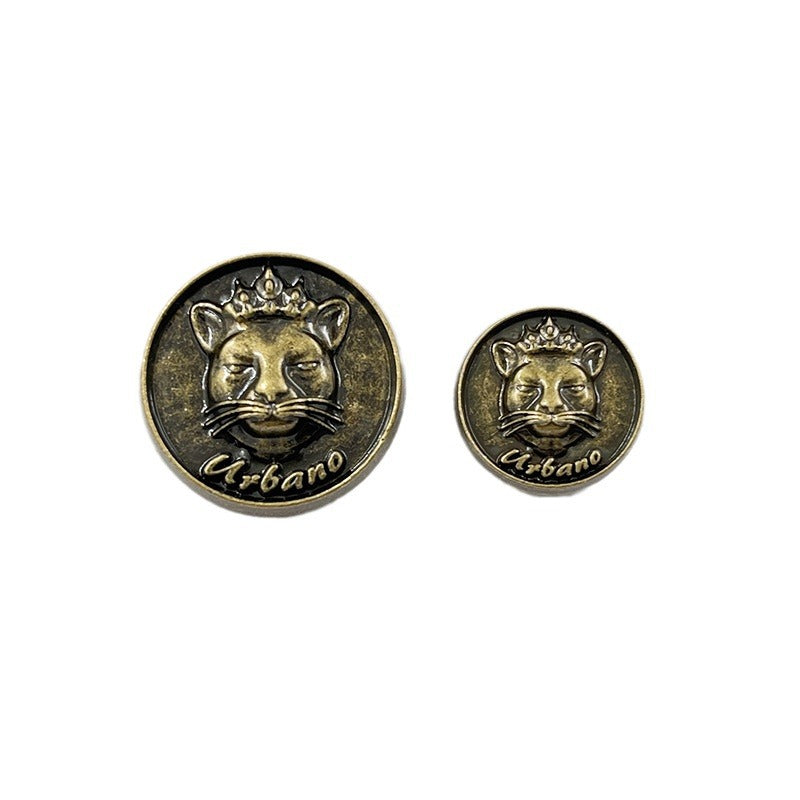 Bronze cat head sewing buttons with crown detail, front view