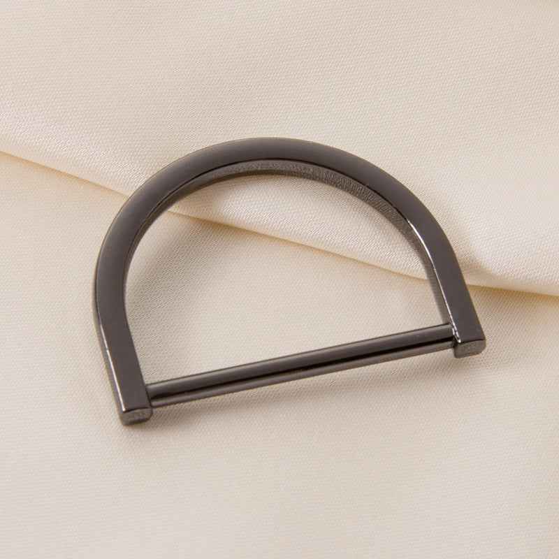 Dark gray metal D-ring strap adjuster buckle with sliding bar