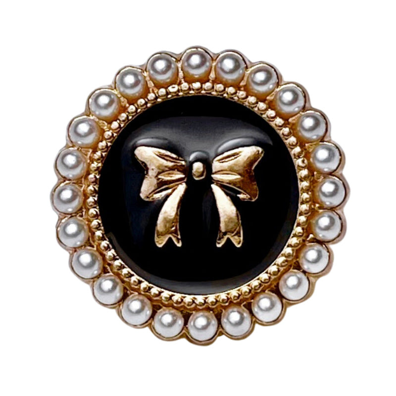 Black bowknot pearl metal button with gold bow center and round pearl border