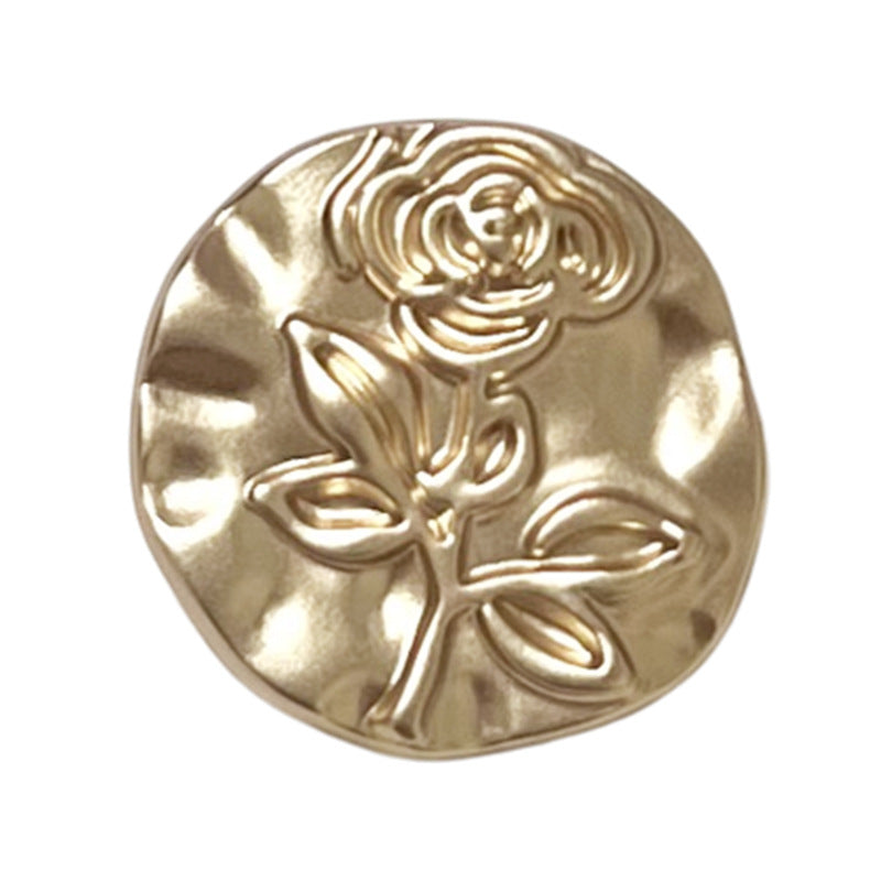 Light gold round metal shank button with embossed rose and leaf pattern