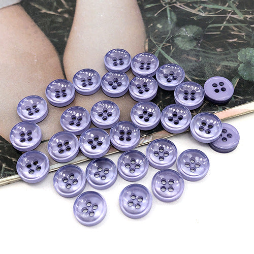 Lilac-blue round 4-hole shirt buttons, stacked view of button fronts