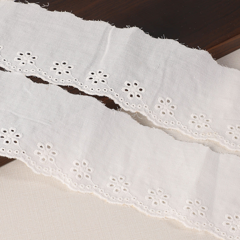 White 45/70mm cotton lace trim with openwork embroidered eyelets, scalloped border