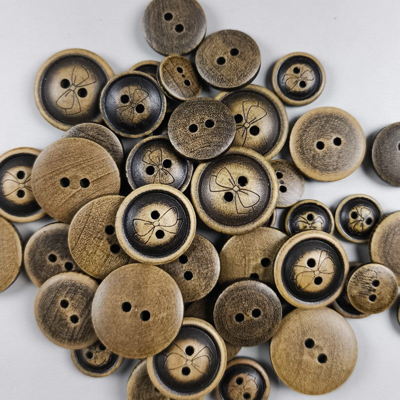 Assorted round wood buttons with butterfly motif and two holes, flat front