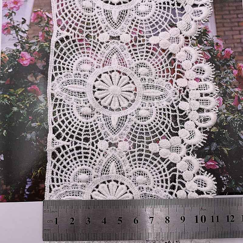 White cotton lace trim panel with lace appliqué flowers and scalloped decorative border