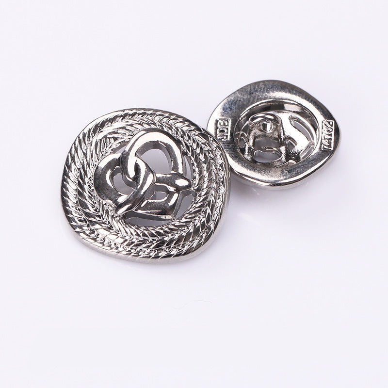 Silver rope-edge hollow heart metal shank button, front view