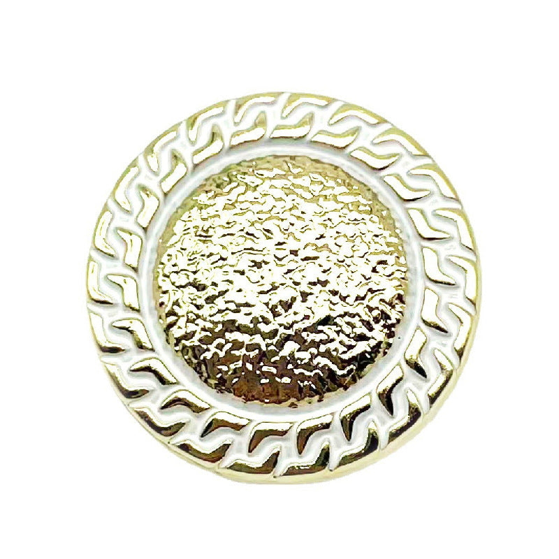 White chain-edged round metal button with gold textured center