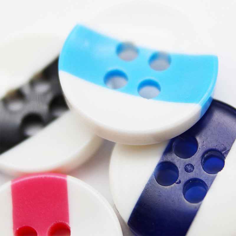 Dual-tone round resin button, 4-hole: light blue top on white base (close-up)