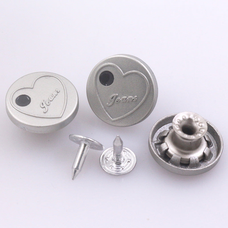 Silver heart stud button with 'Jeans' marking, includes front stud and back