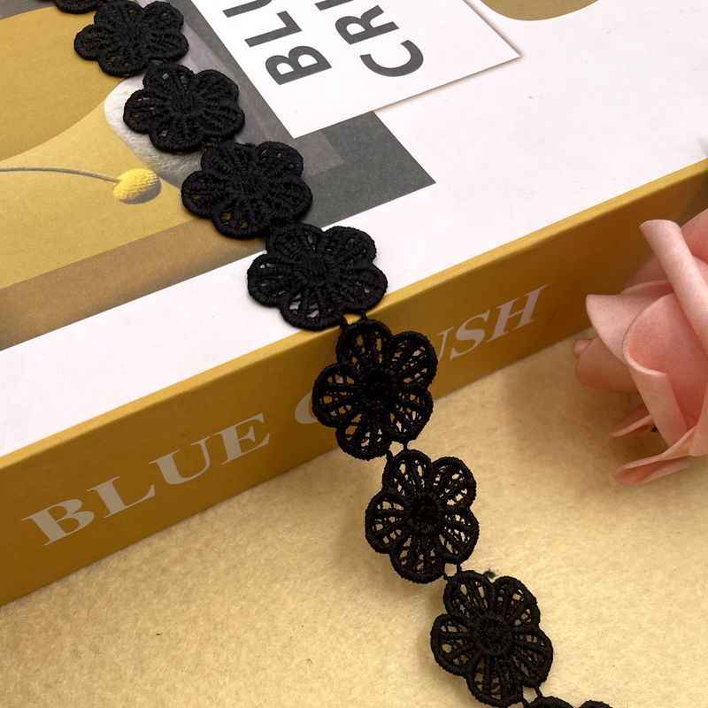Black floral lace trim with round flower appliqués along the lace edge, 2.5–3.7cm