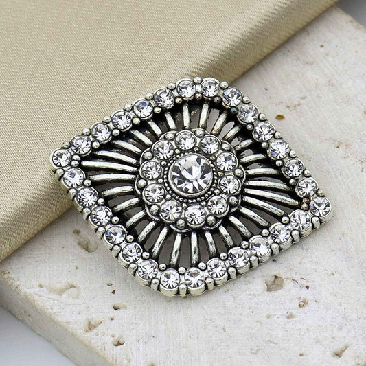 Antique silver rhinestone shank button with round crystal center and radiating prong design