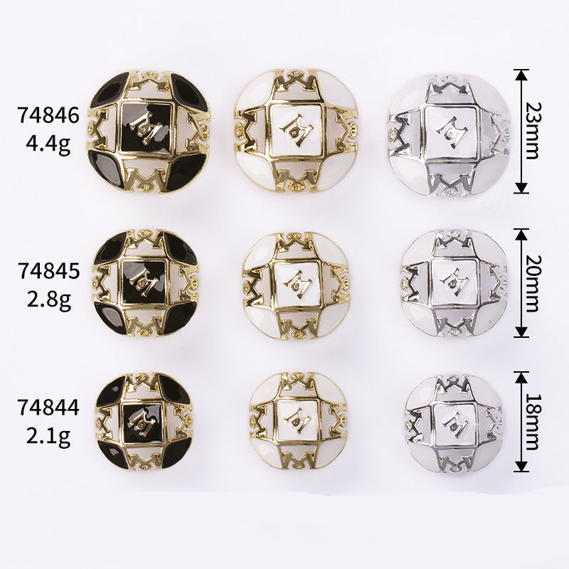 Assorted Letter M buttons, black/white enamel, gold and silver 2-hole shank