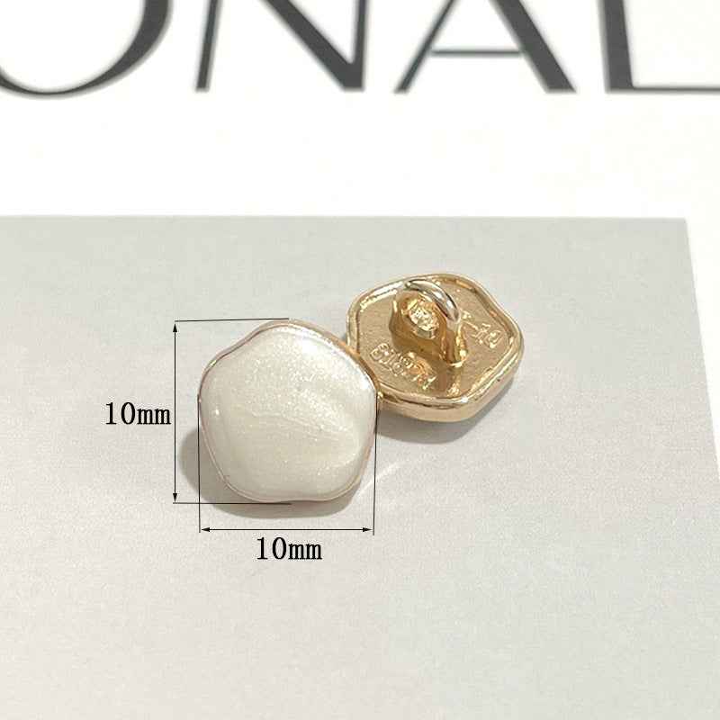 10mm metal shank button with white pearl-look front and gold back