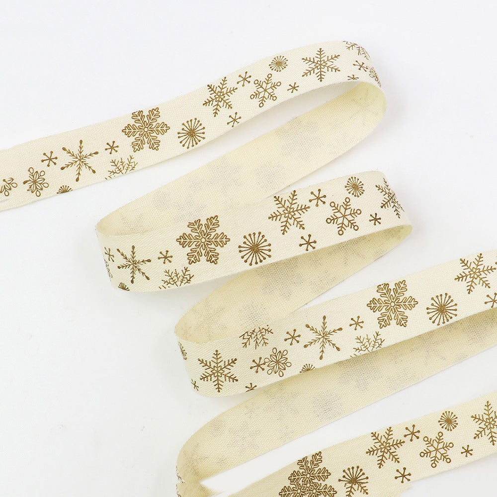 Schrägband-Pack: cremefarbenes Band mit goldenen Schneeflocken-Mustern, gebündelt (7er Set)
