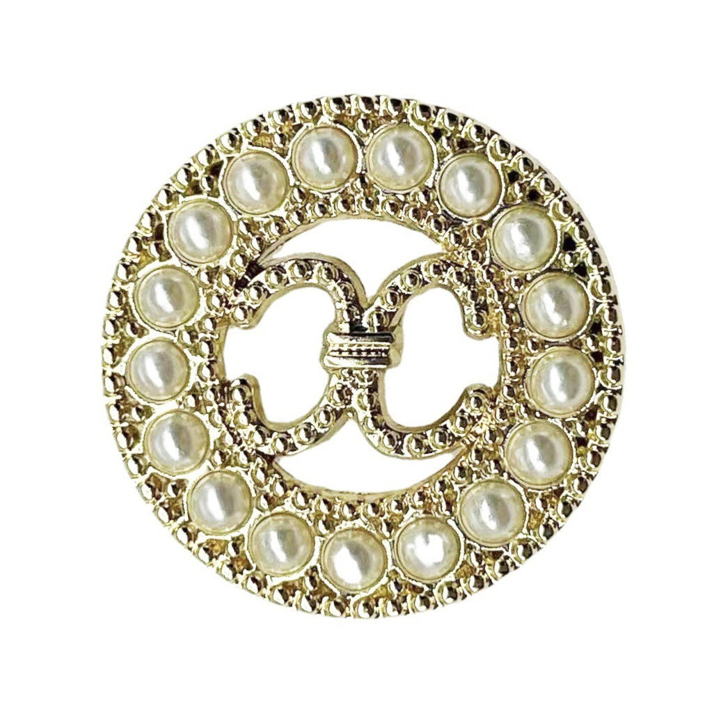 Silver round double C-ring pearl metal shank button with hollow center detail