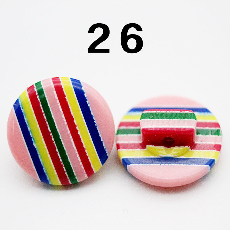 Rainbow striped resin button, multicolor stripes on pale pink base, round shank