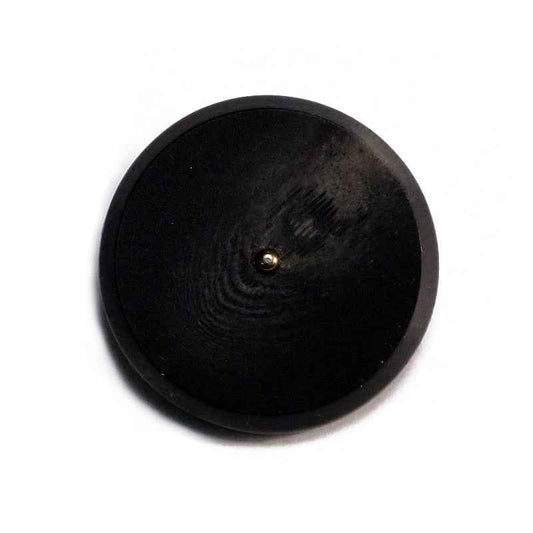 Black round resin button with flat face and metal shank, visible button post