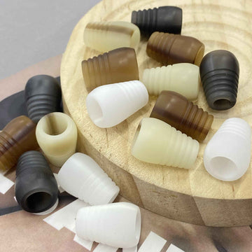 Cream and dark brown resin cord end stoppers with ribbed bell shape (40 pack)