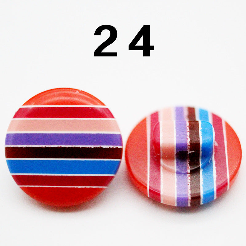 Rainbow striped resin button, red base with white and purple/blue stripes, round shank
