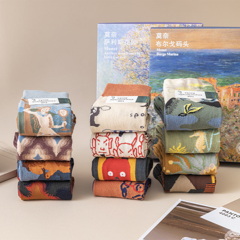 Monet-style cotton socks 4-pack stack: multicolor art prints in blues, oranges, reds, and creams