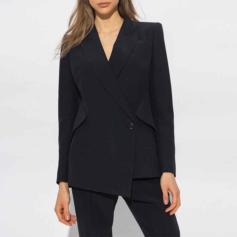 Black blazer front with a small shell butterfly button detail