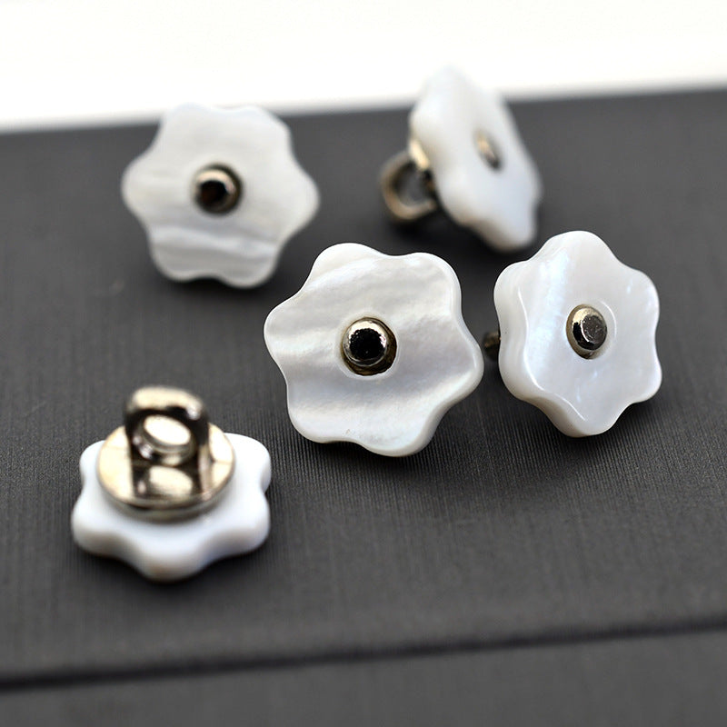 White scalloped shell buttons with metal shank, round center hole
