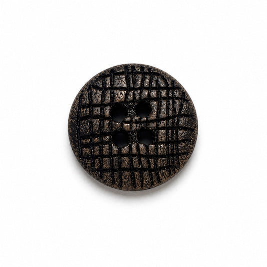 Dark brown flat round wood button with carved grid texture and four holes