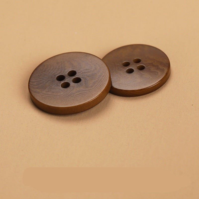 Coffee-brown flat 4-hole buttons, two close-up views