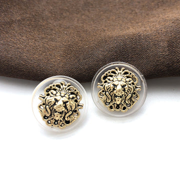 Round 18mm transparent-edge lion head metal shank buttons, dark gold detail (pair shown)