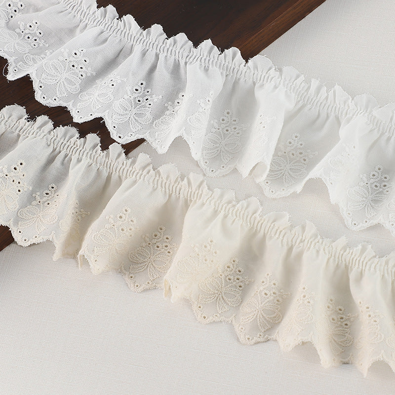 Off-white cotton pleated lace trim with butterfly embroidery and gathered ruffle edge