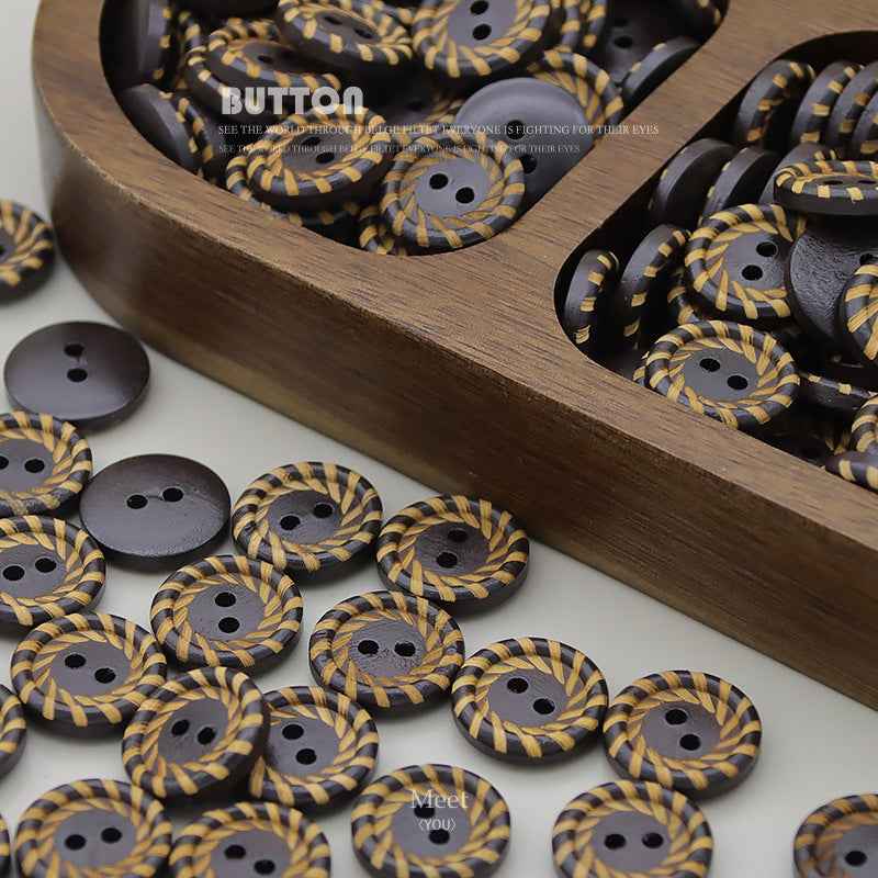 Assorted 15mm round wood buttons, dark brown with yellow woven design, two-hole front