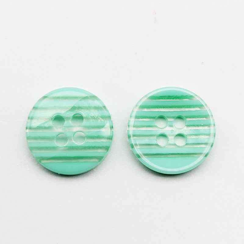 Striped resin 4-hole buttons, mint green stripes on clear/white base
