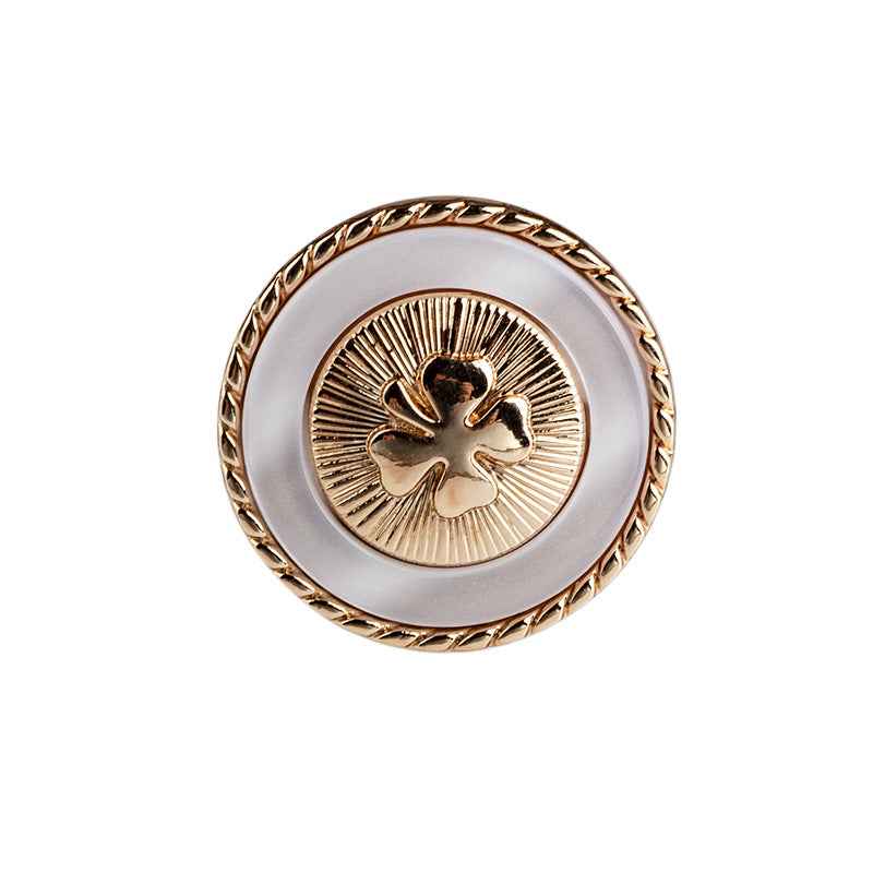 White resin button with four-leaf clover design, gold border and metal shank