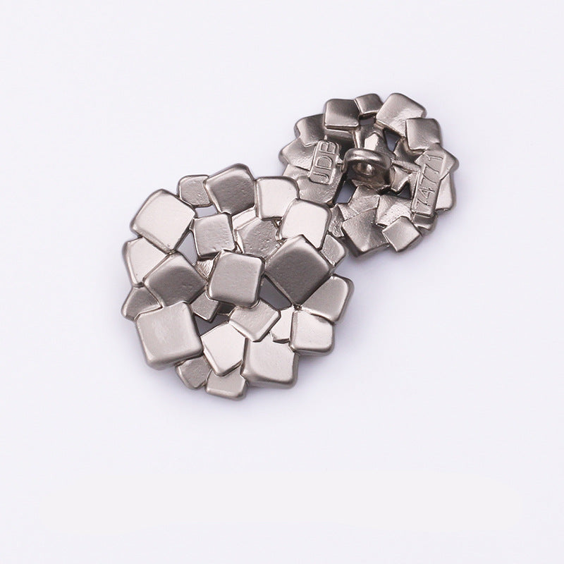 Nickel silver square metal shank buttons, front view, clustered pieces