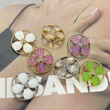 Round clover shank buttons set, mixed colors with gold-tone trim and 5-petal design