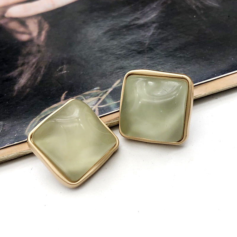 Square stone-look coat buttons, light mint green, gold-tone metal shank, pair view