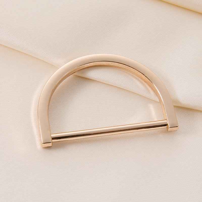 Light gold metal D-ring strap adjuster buckle with sliding bar