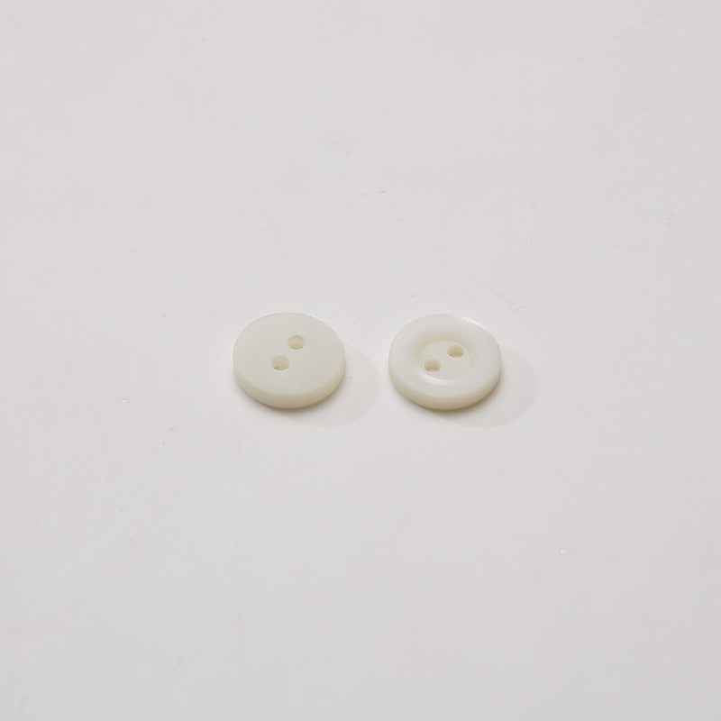 Polished taro shell buttons, 2-hole, ivory—2 button pair