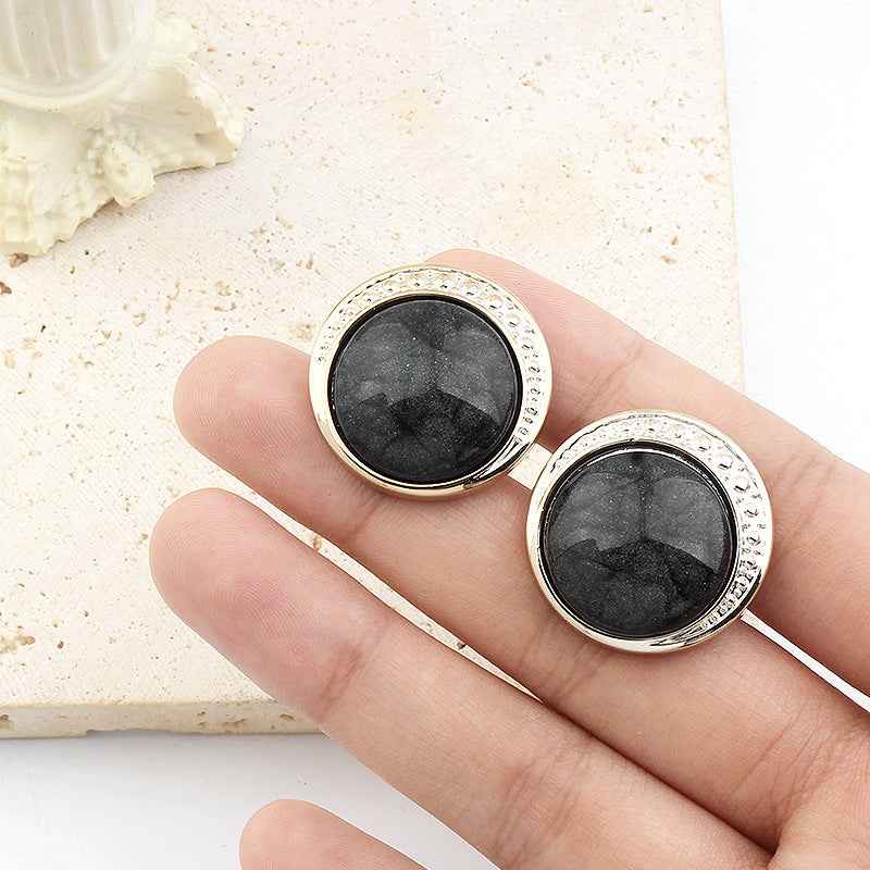 Round resin shank buttons, black color, silver rim with detail, on long shanks