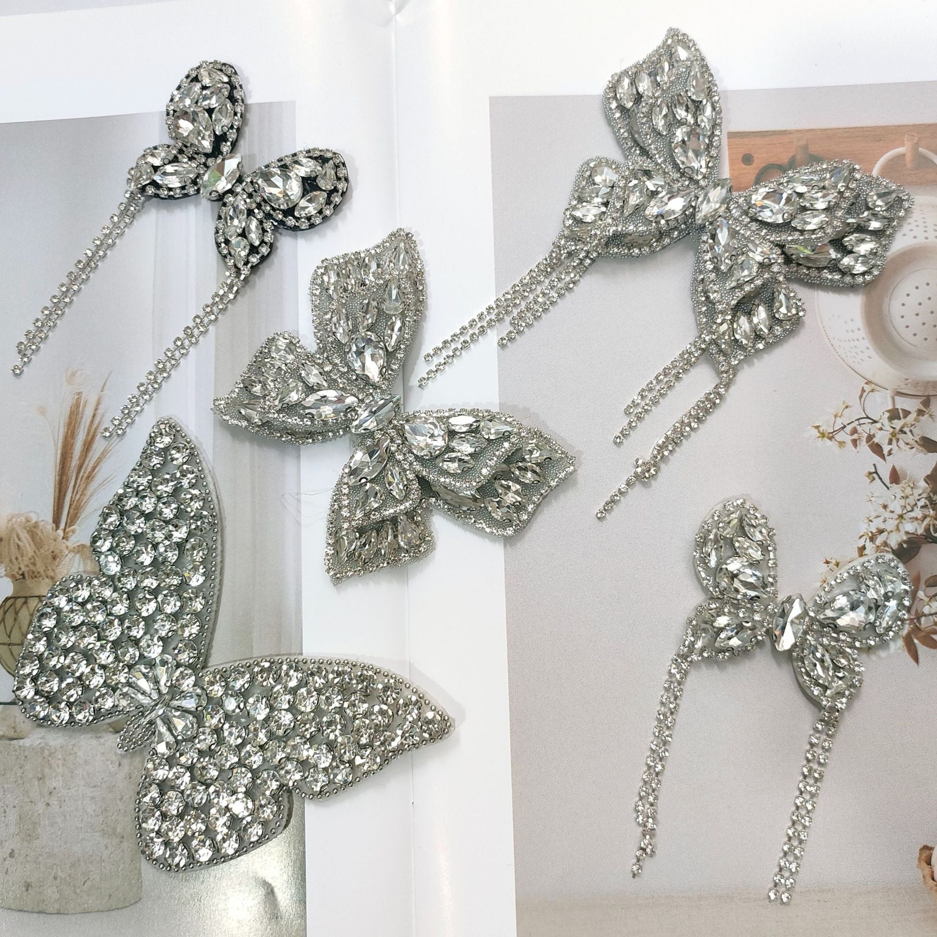 Silver rhinestone butterfly shoe clip applique with dangling chain tassels