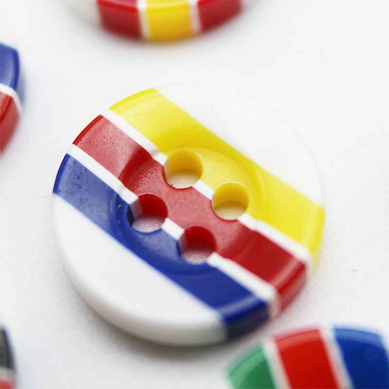 Round resin button with 4 holes, candy stripes: yellow, red, blue with white edge