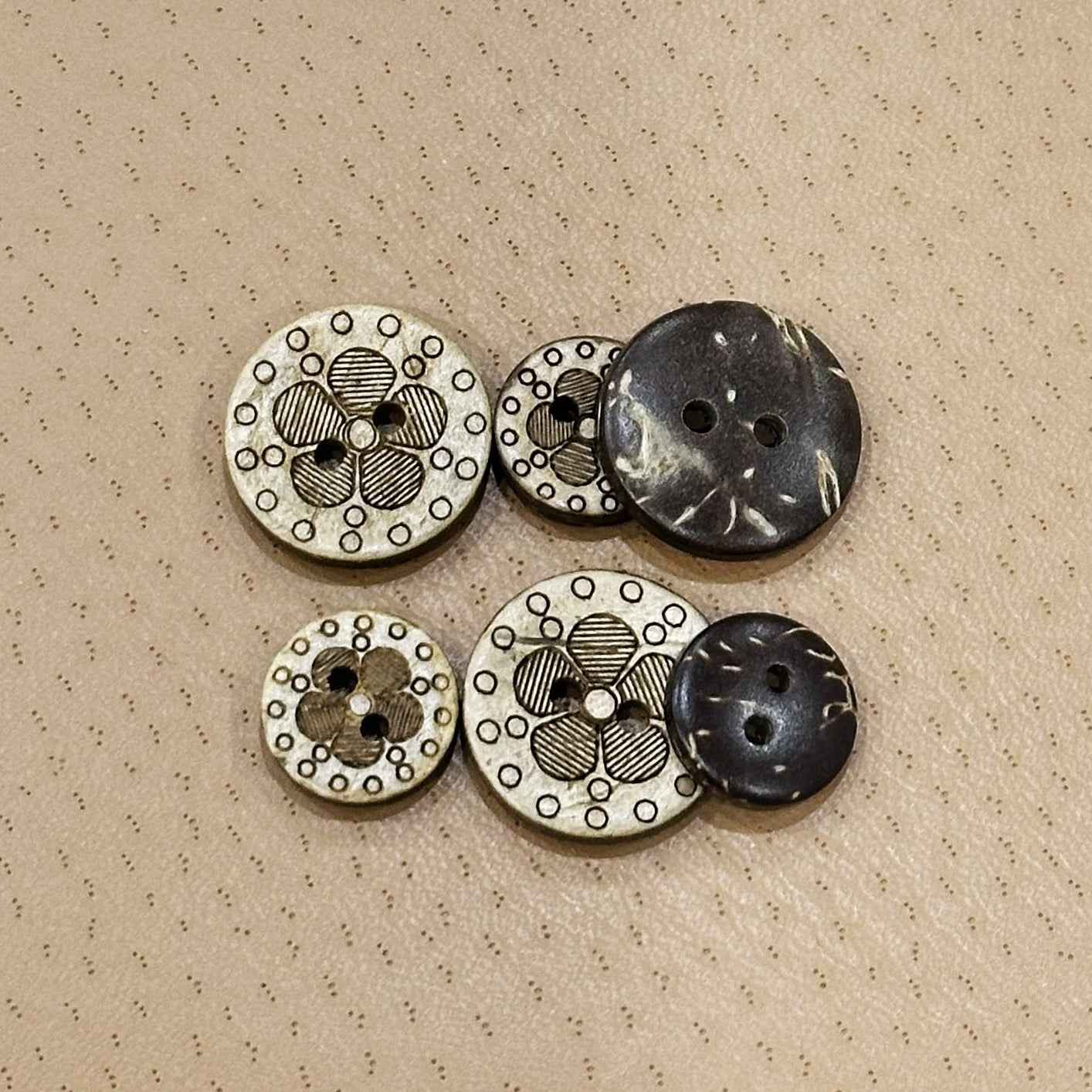 Round coconut shell buttons, mix of dark blue-gray and white floral patterns, 4 holes