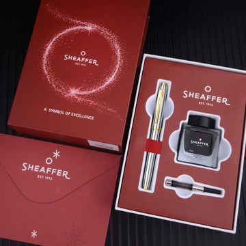 Dárková sada plnicího pera Sheaffer 100 – hrot Fine (~0.5mm), zlatý klip, konvertor a inkoust | leštěný chrom / černý lak / tmavě modrošedá