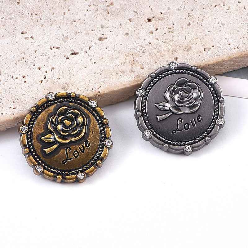 Antique gold and antique silver round rose metal shank buttons, front "Love" rose detail