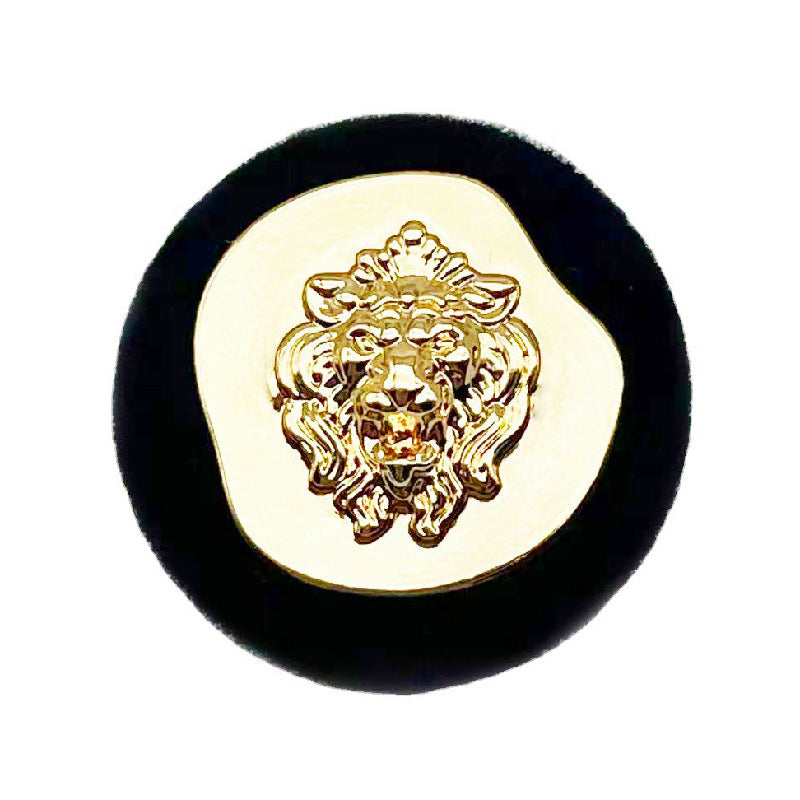 Black lion-head flocked metal blazer button, gold-toned emblem in center