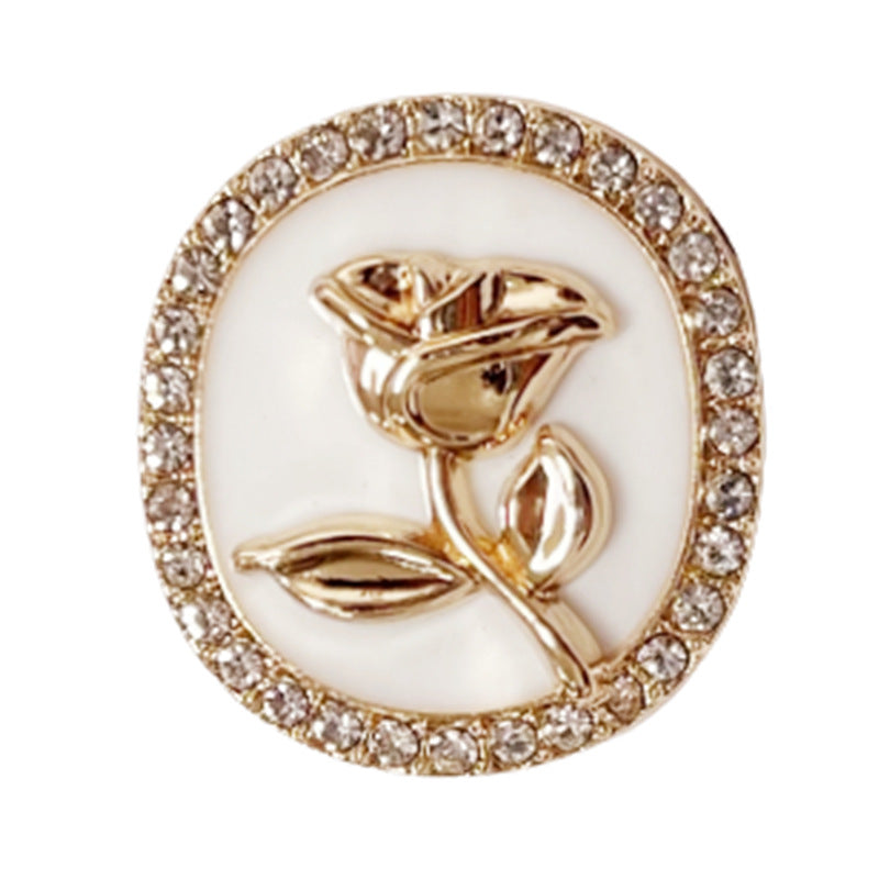 White round rhinestone rose metal shank button with gold-tone crystal border