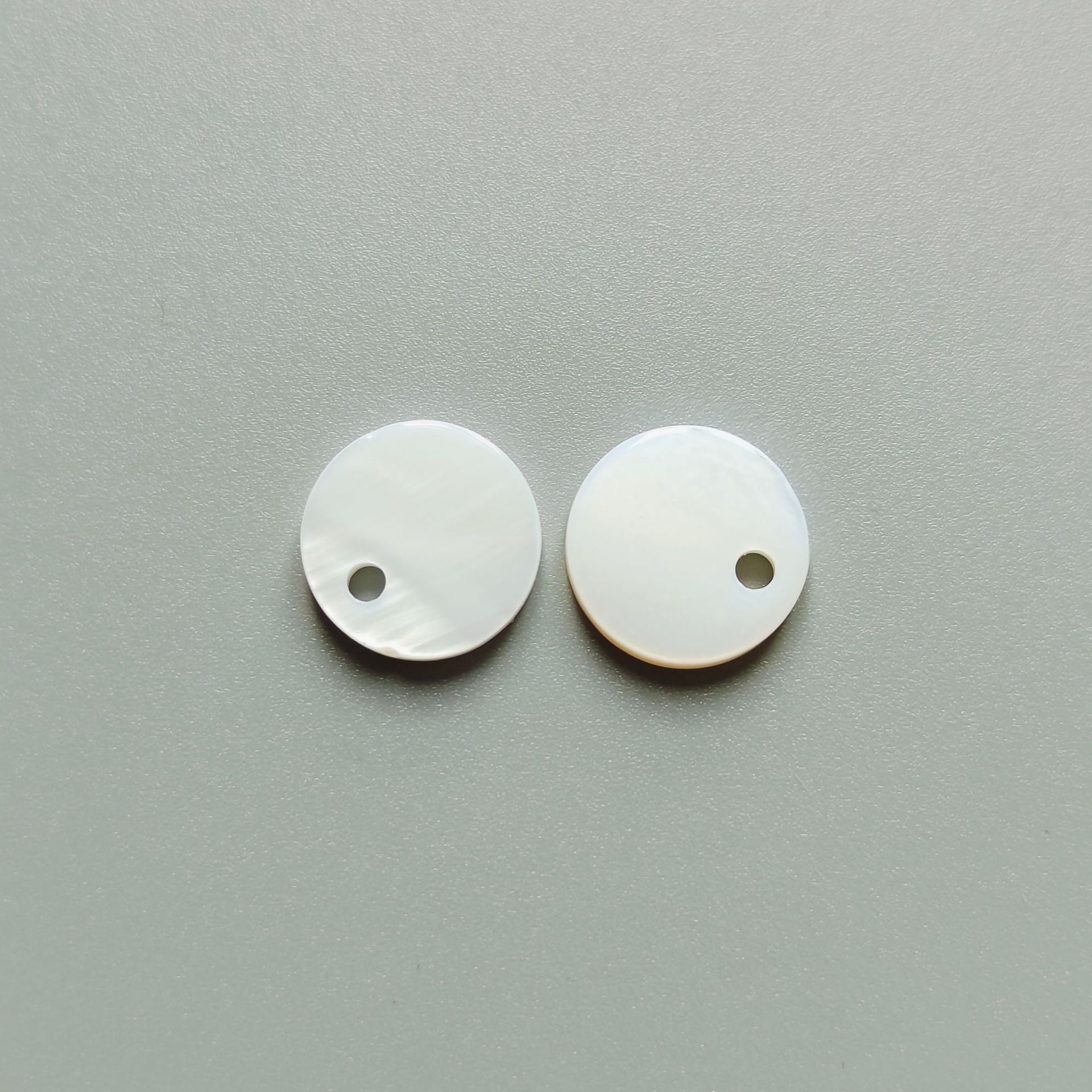 Natural shell round buttons with single hole, 2-pack view