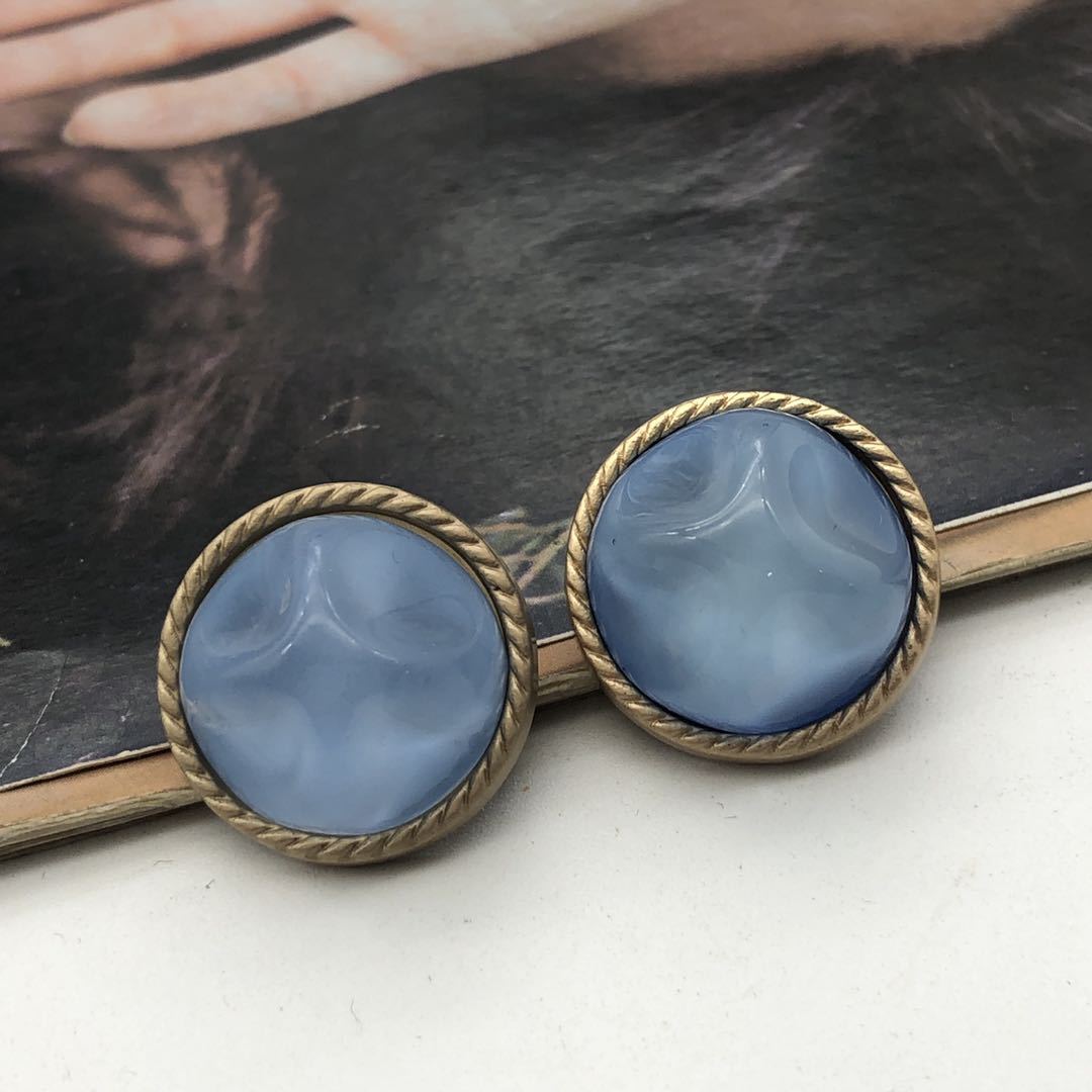 Round coat buttons, blue stone-style center with gold-tone metal rim, 21mm (2 shown)
