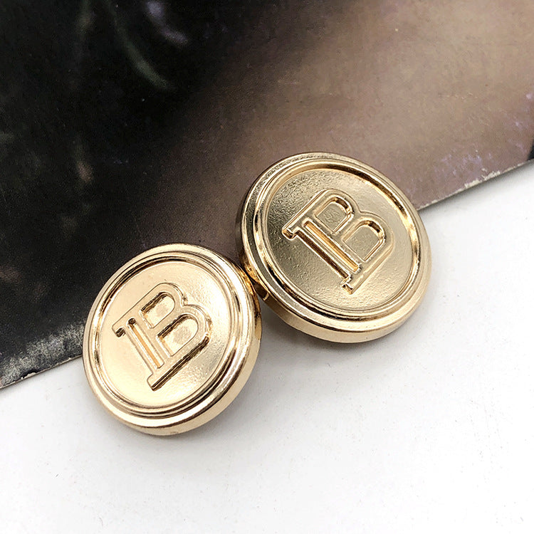 Gold round metal shank buttons with letter “B” engraving, 2 shown
