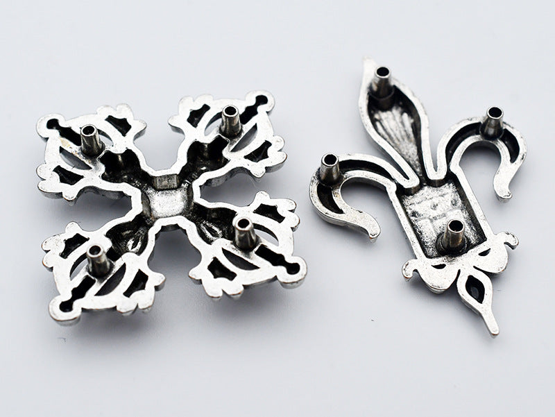 Snowflake-style metal shank stud buttons with two-piece front and back posts